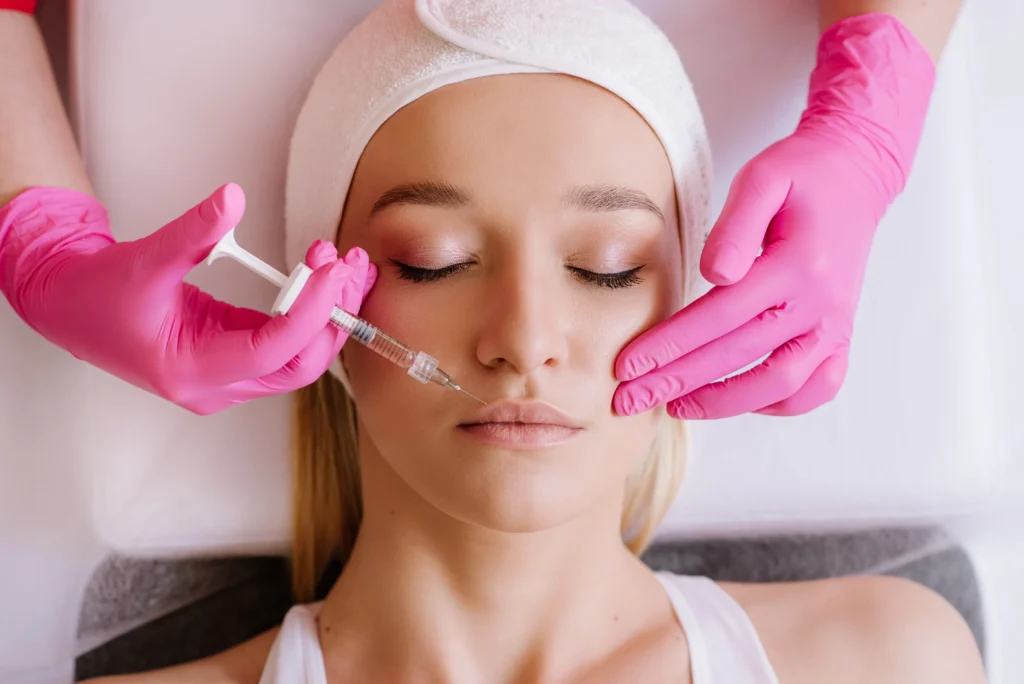 Client receiving dermal filler treatment in Stoneham & Boston MA at Angel Face Injections